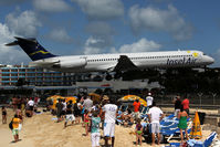 PJ-MDE @ SXM - Over famous Maho Beach - by Wolfgang Zilske
