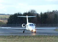 CS-DMB @ EGPH - Netjets Hawker 400XP on taxiway bravo 1 - by Mike stanners
