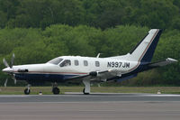 N997JM @ EGHH - Just about to depart on runway 26. - by Howard J Curtis