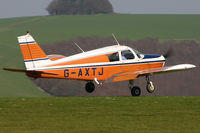 G-AXTJ @ EGHA - Just about to touch down, showing signs of its former operator (CSE). - by Howard J Curtis