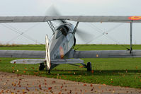 G-BHPL @ EGHA - Privately owned. Kicking up the leaves as it turns. - by Howard J Curtis