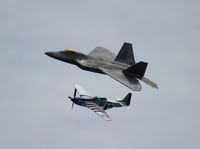 03-4042 - F-22 heritage flight with P-51D Crazy Horse at Cocoa Beach - by Florida Metal