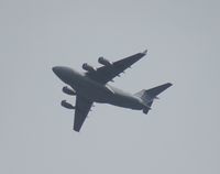 07-7170 - C-17 departing from MCO over Orlando Executive Airport - by Florida Metal