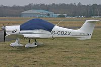 G-CBZX @ EGHH - Privately owned - by Howard J Curtis