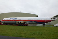 9M-MMI @ EGBP - ex Malaysia Airlines B737 fuselage on a lowloader at Kemble - by Chris Hall