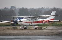 G-ATKT @ EGHH - Parked at Airtime North - by John Coates
