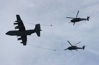 65-0976 - HC-130P Hercules over Cocoa Beach with Pavehawks - by Florida Metal