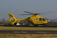 G-SASB @ EGEO - Scottish Ambulance Service Eurocopter departing from Oban airport. - by Jonathan Allen