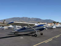 N7043M @ SZP - 1958 Cessna 175 SKYLARK, Franklin 6A&6V335 220 Hp conversion from geared Continental GO-300 175 Hp, taildragger conversion. Santa Paula Ridge & Peak at 4,957' in background. - by Doug Robertson