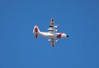 1716 - Coast Guard HC-130H flying over Tampa Airport - by Florida Metal