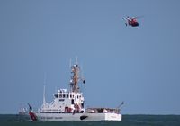 6511 - HH-65C Dolphin over Daytona Beach