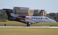 C-FMPN @ ORL - Phenom 300 in for NBAA - by Florida Metal