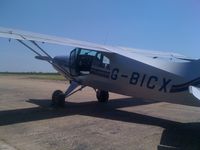 G-BICX @ EGSN - Maule M5 in the May sun 2012 just had maintenance at bourn Cambs ready to return to Cranfield base. - by Glatfelder