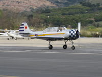 N6294D @ SZP - 1983 Yakovlev YAK 52, Vedeneev (Ivchenko) M-14P 360 Hp radial, landing roll Rwy 22 - by Doug Robertson