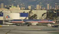 N647AM @ KLAX - Getting towed to the gate at LAX - by Todd Royer