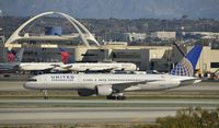 N515UA @ KLAX - Arriving at LAX on 25L - by Todd Royer