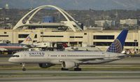 N571UA @ KLAX - Arriving at LAX on 25L - by Todd Royer