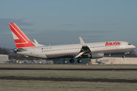 OE-LNK @ EGHH - Lauda Air, just about to touch down. - by Howard J Curtis