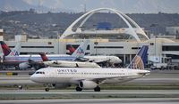 N463UA @ KLAX - Arriving at LAX on 25L - by Todd Royer