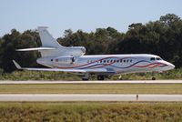 HB-JSZ @ ORL - Falcon 7X departing NBAA