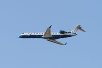 N792SK @ KLAX - SkyWest/United Express Bombardier CL-600-2C10, SKW6528 departing on RWY 25R KLAX on a flight to Phoenix-KPHX. - by Mark Kalfas
