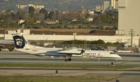 N404QX @ KLAX - Taxiing to gate - by Todd Royer