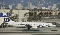 N552AS @ KLAX - Taxiing to gate - by Todd Royer
