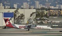 N401QX @ KLAX - Taxiing to gate