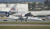N433QX @ KLAX - Taxiing to gate