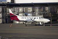 VH-TAM @ YSSY - Brindabella Airlines (VH-TAM) Fairchild SA227-AC Metro III at Sydney Airport. - by YSWG-photography