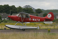 G-WATR @ EGEO - Caught on departure. - by Howard J Curtis