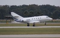 N18HN @ ORL - Falcon 20 at NBAA - by Florida Metal