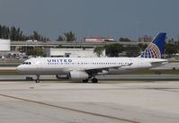 N454UA @ KFLL - Airbus A320 - by Mark Pasqualino