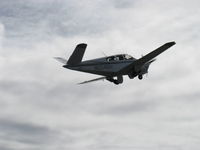 N224SH @ SZP - 1970 Beech V35B BONANZA, Continental IO-520-B 285 Hp, takeoff climb Rwy 22, gear coming up - by Doug Robertson