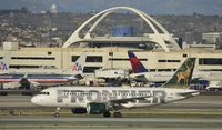 N918FR @ KLAX - Taxiing to gate at LAX - by Todd Royer