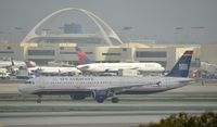 N170US @ KLAX - Taxiing to gate on a foggy morning - by Todd Royer