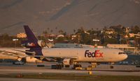N522FE @ KLAX - Taxiing to parking at LAX - by Todd Royer