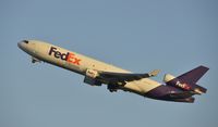 N621FE @ KLAX - Departing LAX - by Todd Royer