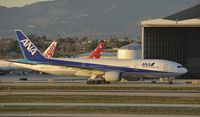 JA716A @ KLAX - Taxiing for departure at LAX - by Todd Royer