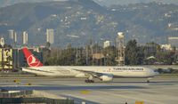 TC-JJK @ KLAX - Taxiing to gate at LAX - by Todd Royer