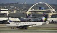 XA-VOS @ KLAX - Taxiing to gate LAX - by Todd Royer