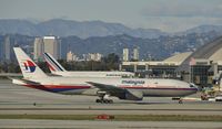 9M-MRB @ KLAX - Taxiing to gate at LAX - by Todd Royer