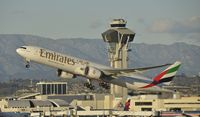 A6-EGF @ KLAX - Departing LAX - by Todd Royer
