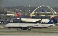 N566UW @ KLAX - Taxiing to gate at LAX - by Todd Royer