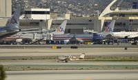 N18469 @ KLAX - Small fish in a big pond - by Todd Royer