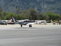 N9409P @ SZP - 1969 Piper PA-24-260TC TURBO COMANCHE C, Lycoming TIO-540-N1A5 260 Hp, landing Rwy 22 - by Doug Robertson