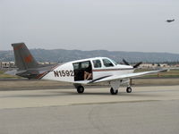 N1592L @ CMA - 1976 Beech A36 BONANZA, Continental IO-520 285 Hp, modified for aerial photography of warbirds. See MyBombshells.com, taxi - by Doug Robertson