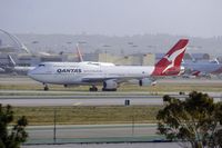 VH-OJT @ KLAX - Qantas Airways Longreach early morning arrival on 25R - by speedbrds