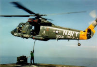 149031 - Shaka 14 hooks up a cargo load from the deck of USNS Harkness (T-AGS 32)  in the Banda Sea, Indonesia, late 1986. Photo by AE2 Barry Sinclair. - by trygstad