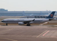 B-6502 @ AMS - Taxi to the gate of Schiphol Airport - by Willem Göebel